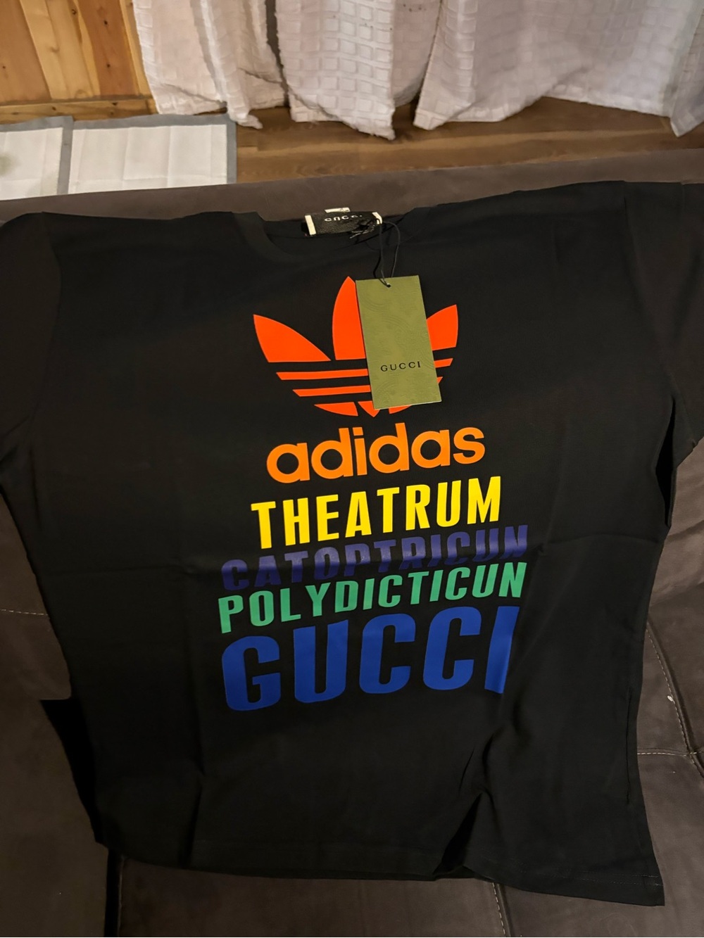 Gucci Black Long-Sleeve Tee with Multicolor Logo Print